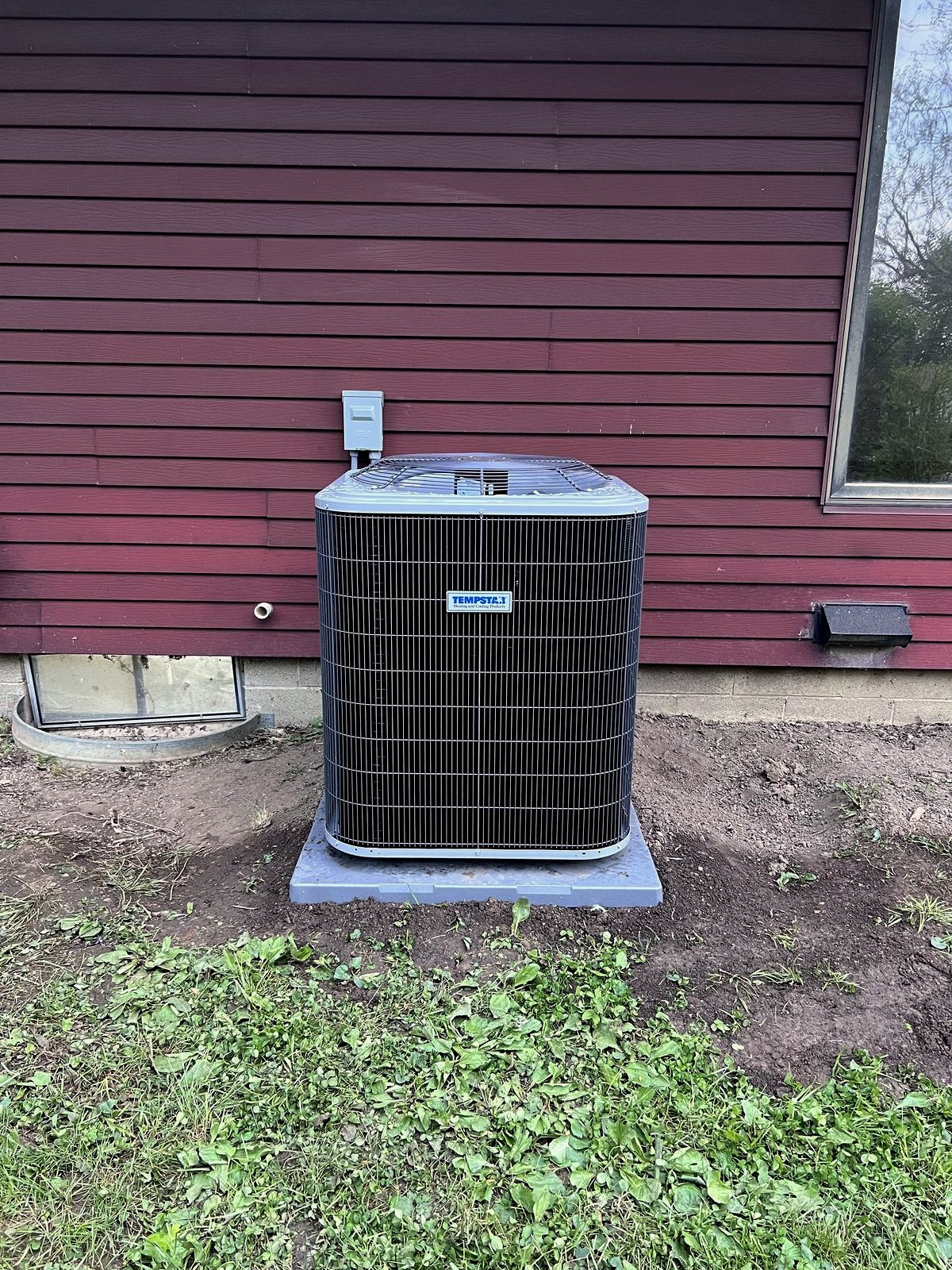 Finished outdoor Tempstar air conditioning installation